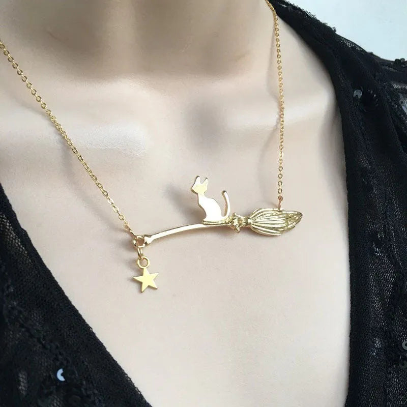 Alloy necklace with a simple black cat pendant for Halloween, shown in silver and gold colour options.