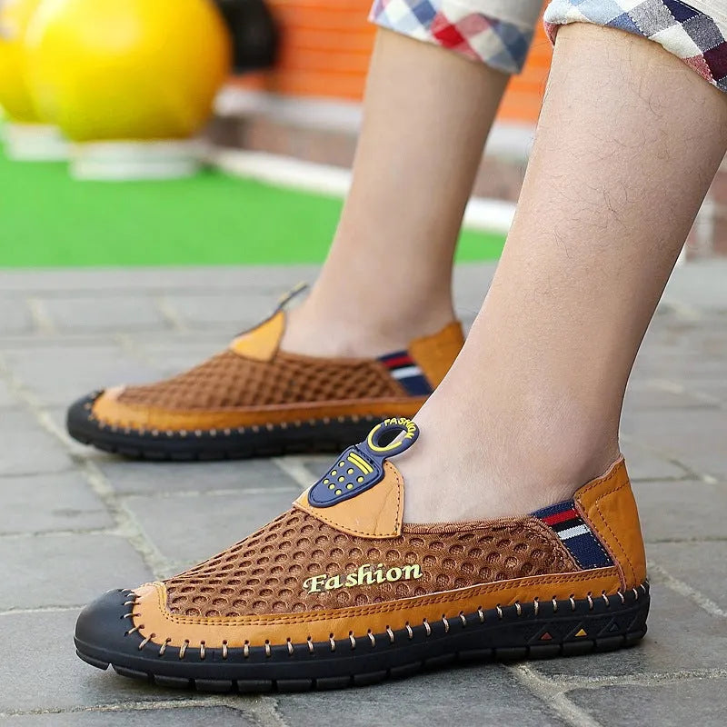 Men's solid-colour casual mesh shoes with a round toe and non-slip rubber sole.