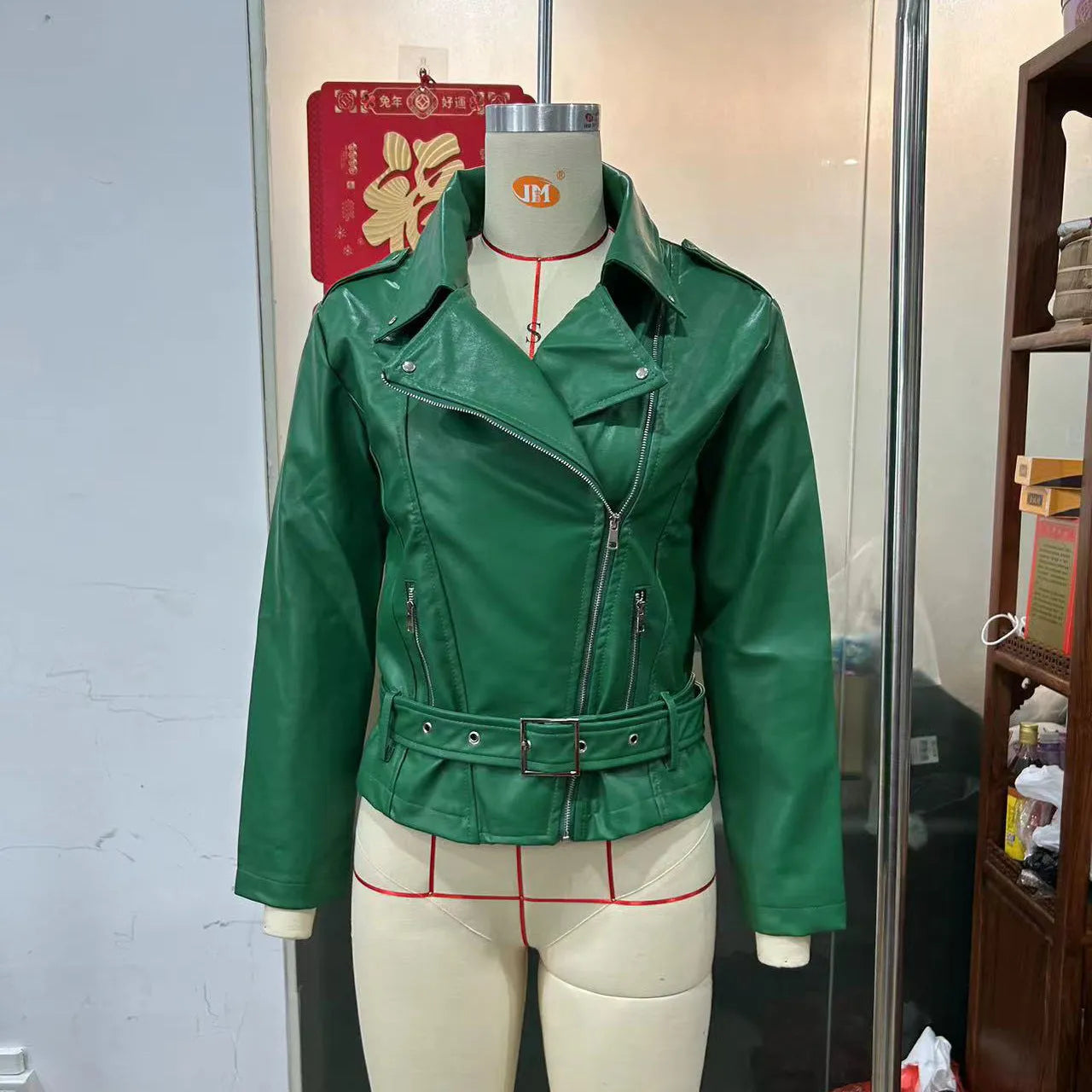 Punk style short jacket with a Peter Pan collar and drawstring waist in black, blue, or green.