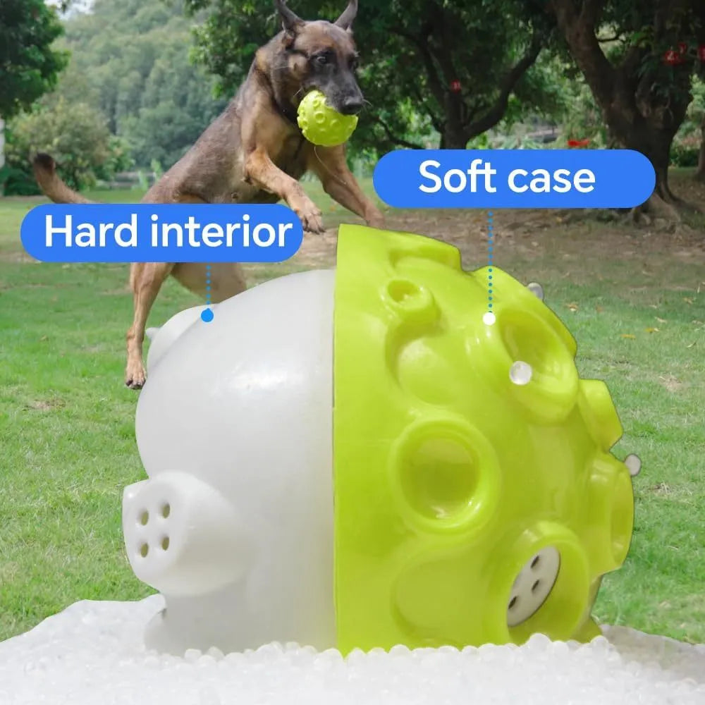 Durable natural rubber dog ball toy with textured surface and squeaker for aggressive chewers.