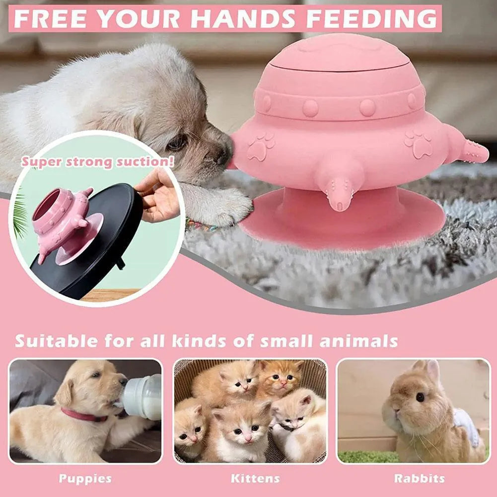 Pink silicone pet nursing device with milk bowl and four pacifiers for puppies and kittens.
