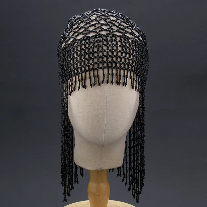 Belly dance hat with alloy frame, beaded ornamentation and tassels in silver or black