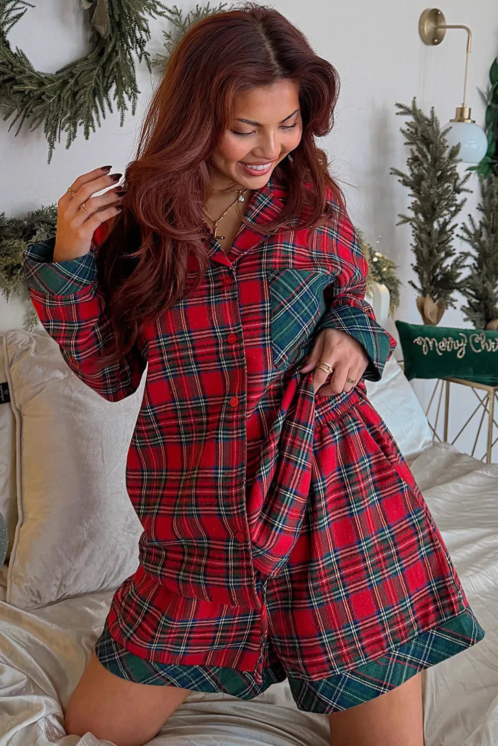 Red plaid Christmas holiday long sleeve shirt and shorts two-piece pajama set.