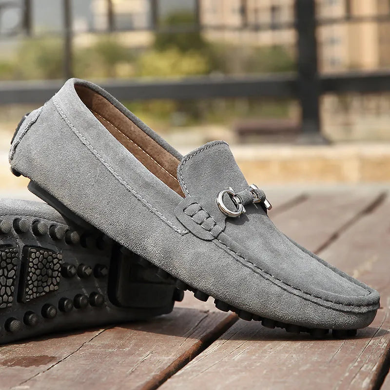 Men's black slip-on cowhide leather shoes with a square toe and flat heel on a white background