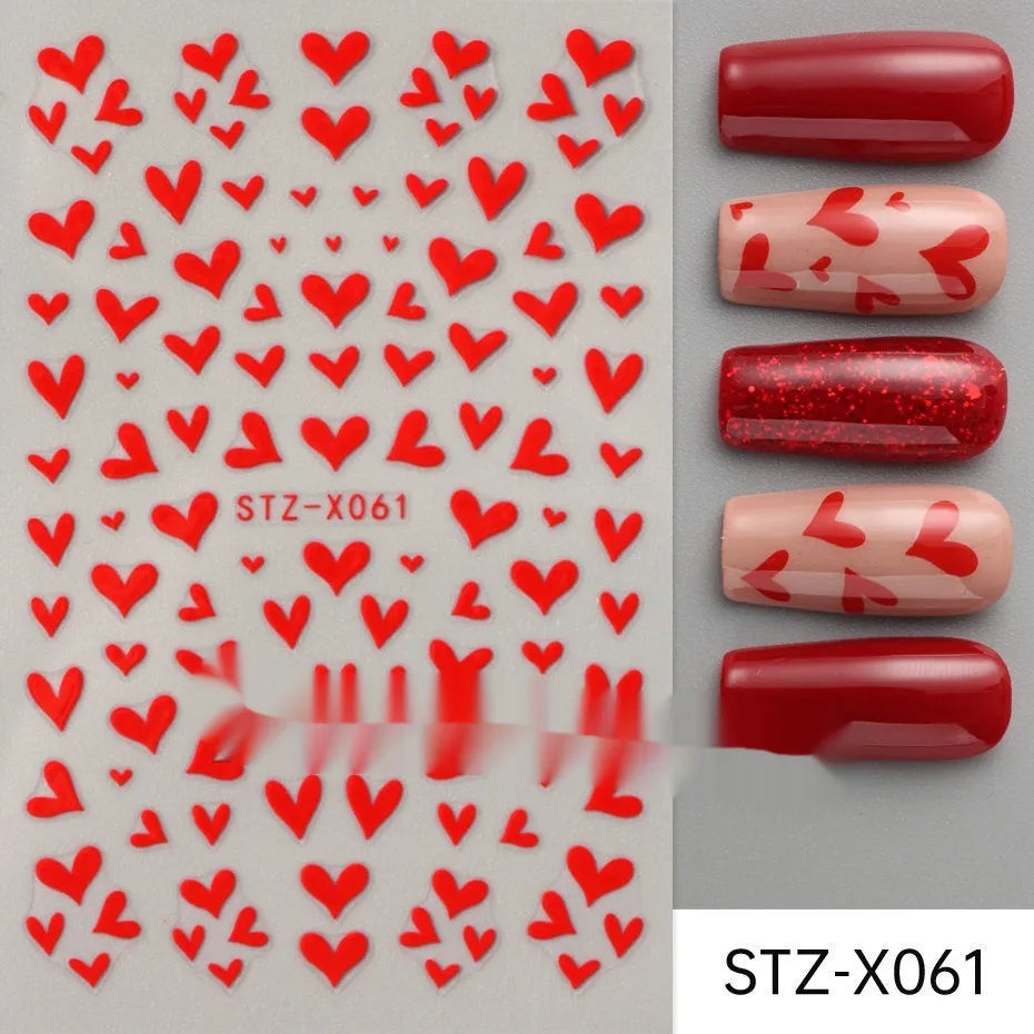 Sheet of black and silver love heart pattern nail art stickers with a plastic nail patch.
