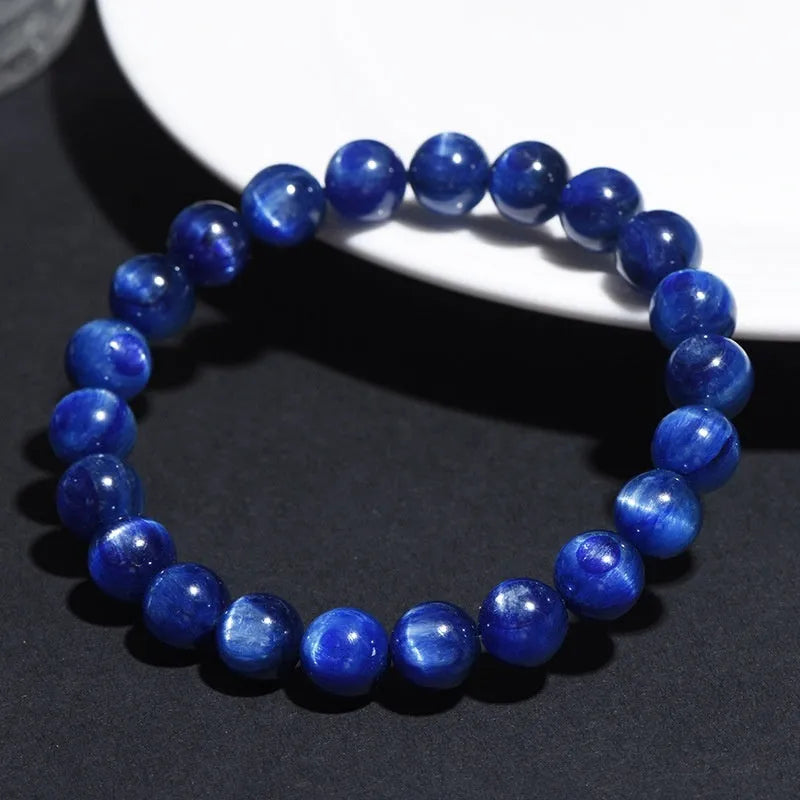 Natural blue crystal ball bracelet with geometric Ruyi design in polished grade 7A crystal