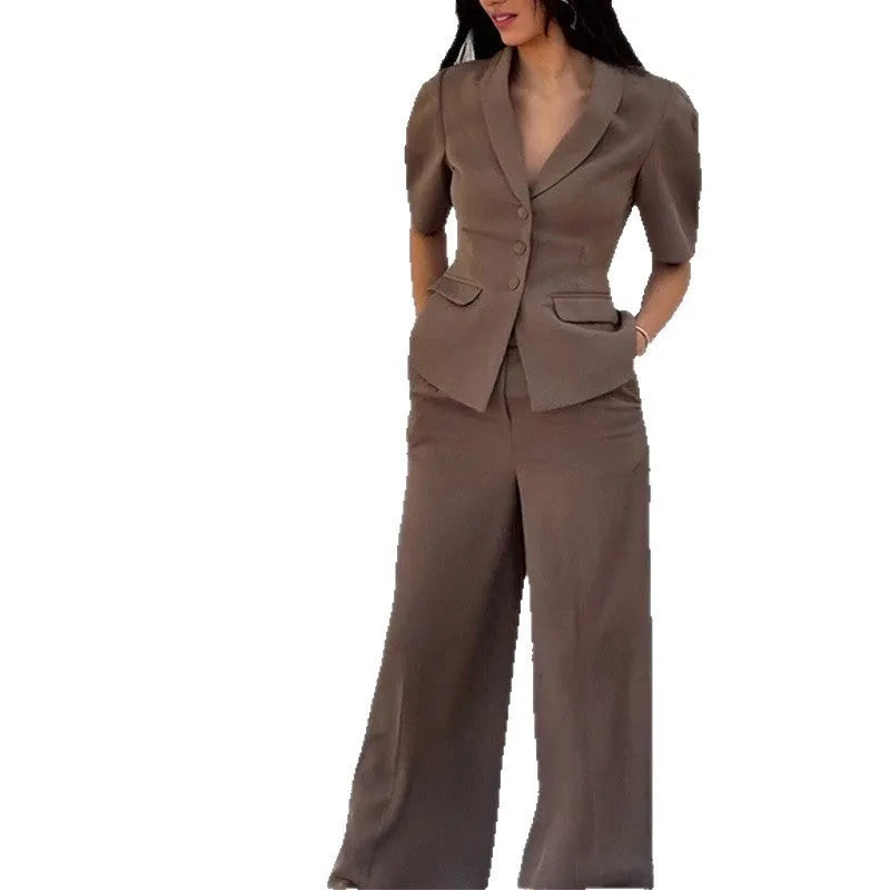 Brown polyester men's two-piece suit with slim-fit trousers and long-sleeve top on hanger