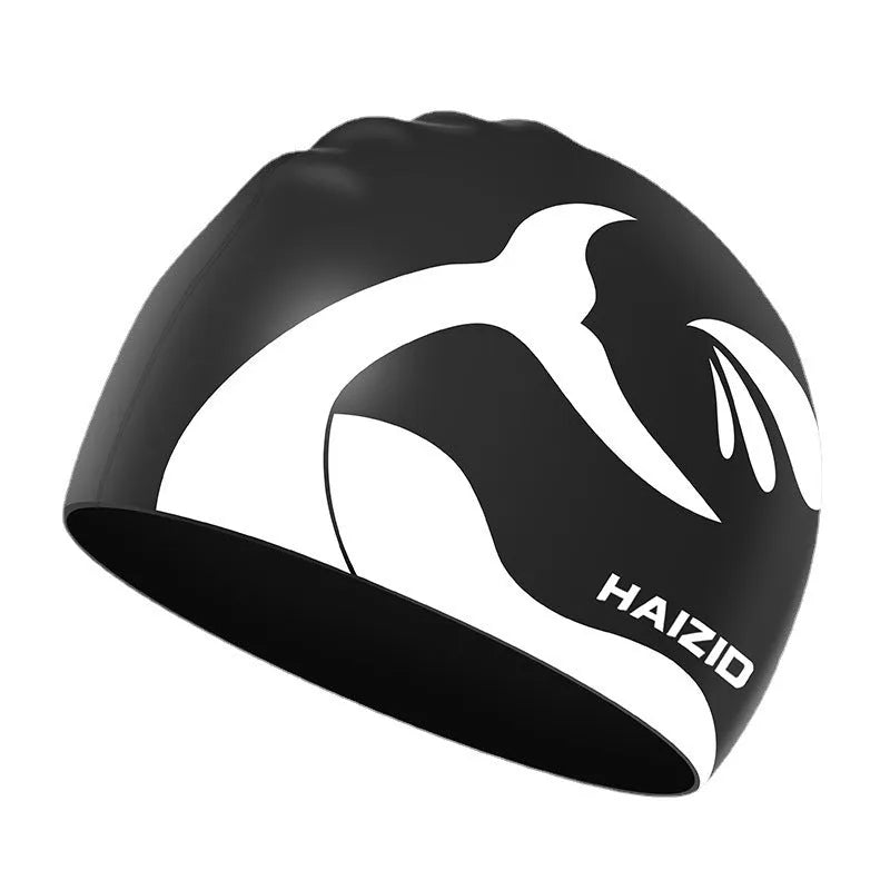 Silicone swimming cap with waterproof ear protectors showing whale tail pattern in multiple colour options