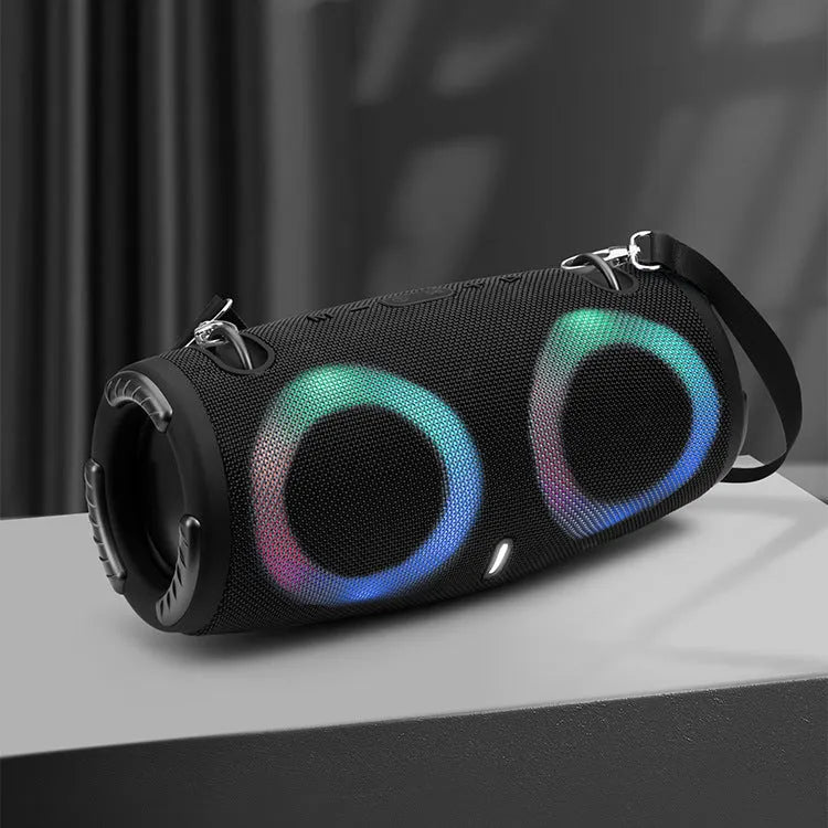 War Drum portable Bluetooth speaker with RGB lights in camouflage colour with carrying strap.