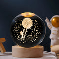 Luminous crystal ball desktop decoration on wooden base with starry sky projection effect