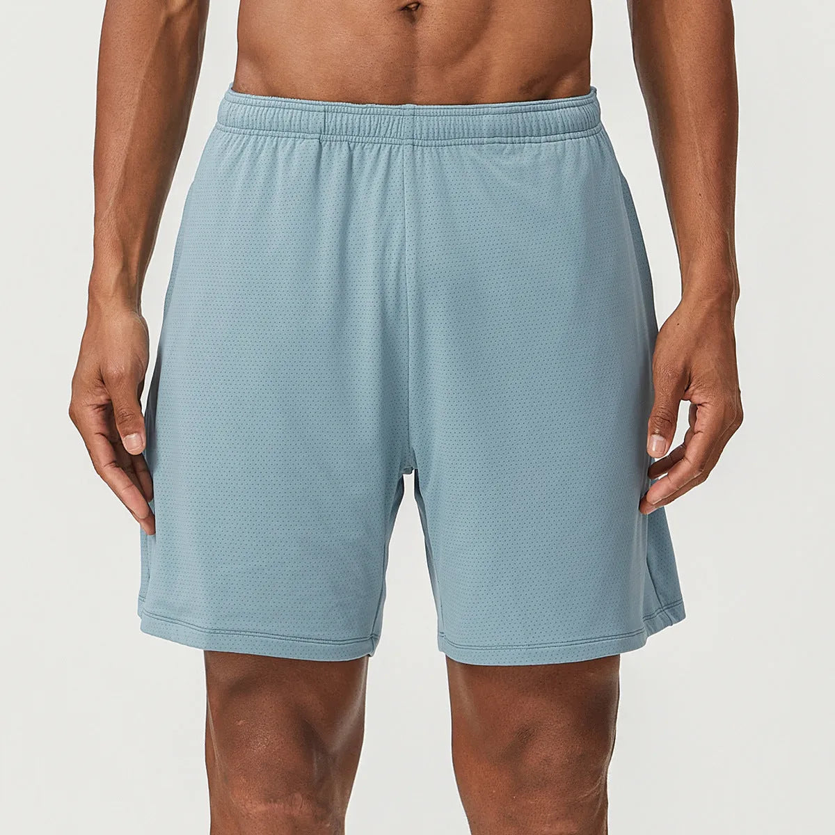 Men's quick-dry double-layer running shorts in various colours on a neutral background.