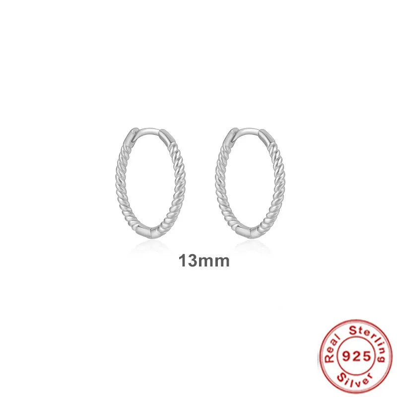Sterling silver twisted ring earrings in geometric round design with gold or platinum finish