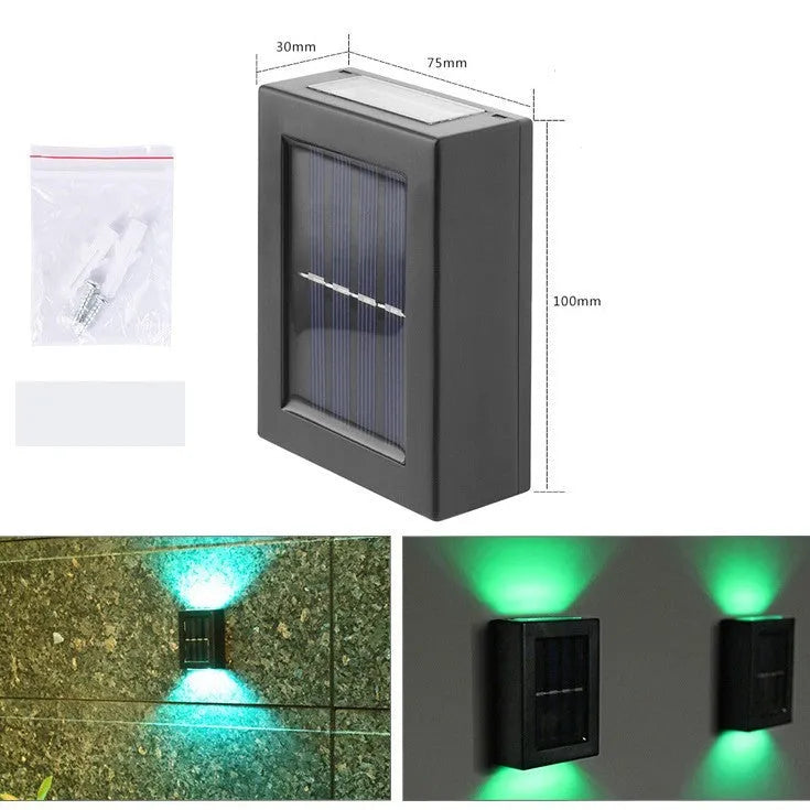 Solar garden wall light with upward and downward LED illumination for outdoor decorative lighting