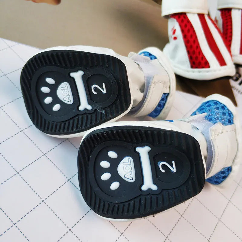Blue zipper closure cloth dog shoes with non-slip soles for small breeds.