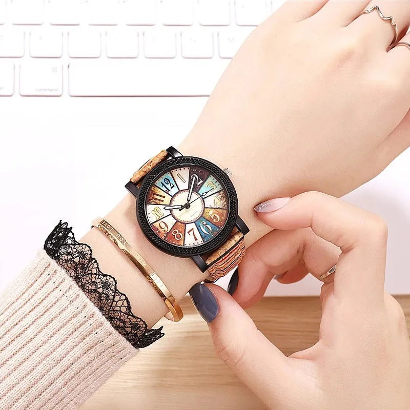 Women's vintage-style quartz watch with brown leather strap and 37mm round dial
