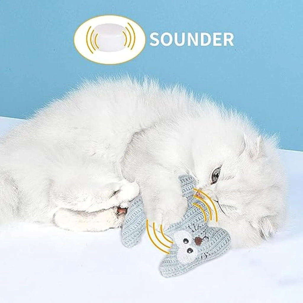 Cyan and light coffee coloured plush catnip toy with a bell, shown next to a measuring tape indicating 12cm length.