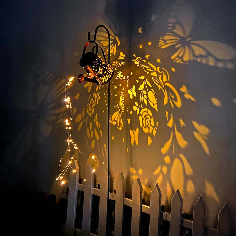 Solar garden lamp with tapered butterfly iron design and warm white LED light