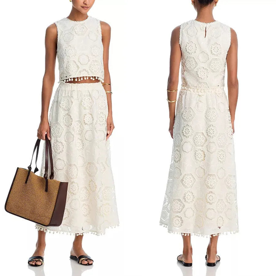White women's retro suit set with sleeveless top and embroidered long skirt