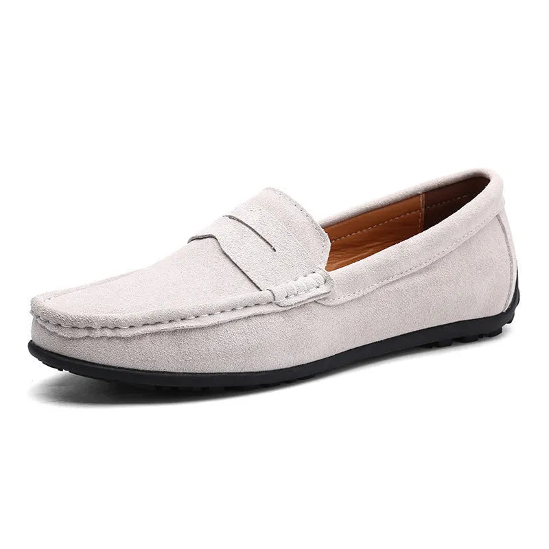 Men's brown suede leather casual shoes with round toe and flat rubber sole on a white background