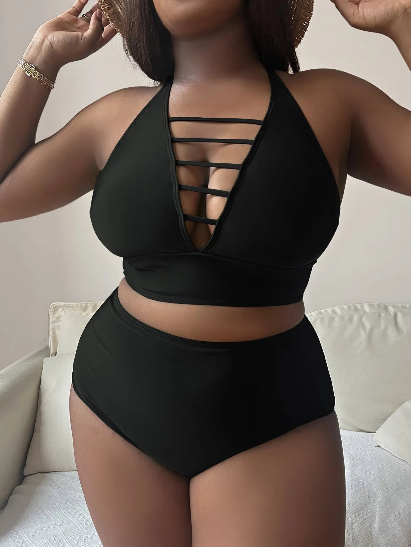 Plus size black halter bikini with adjustable cross straps and high waist briefs