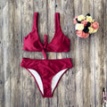 Ladies polyester bikini set in black colour with matching bra and panties