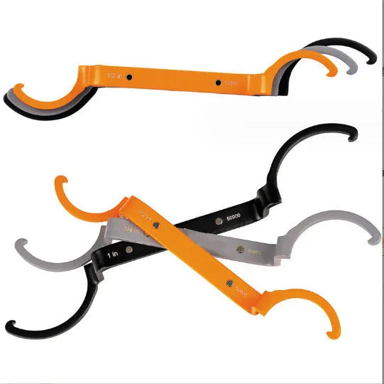 Three-piece magnetic suction wrench set in orange, grey, and black with catheter locking mechanisms