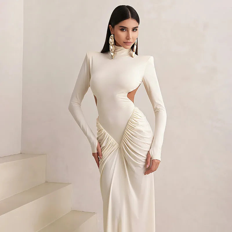 Long sleeve high collar slim fit dress with pleated backless detail in a solid colour