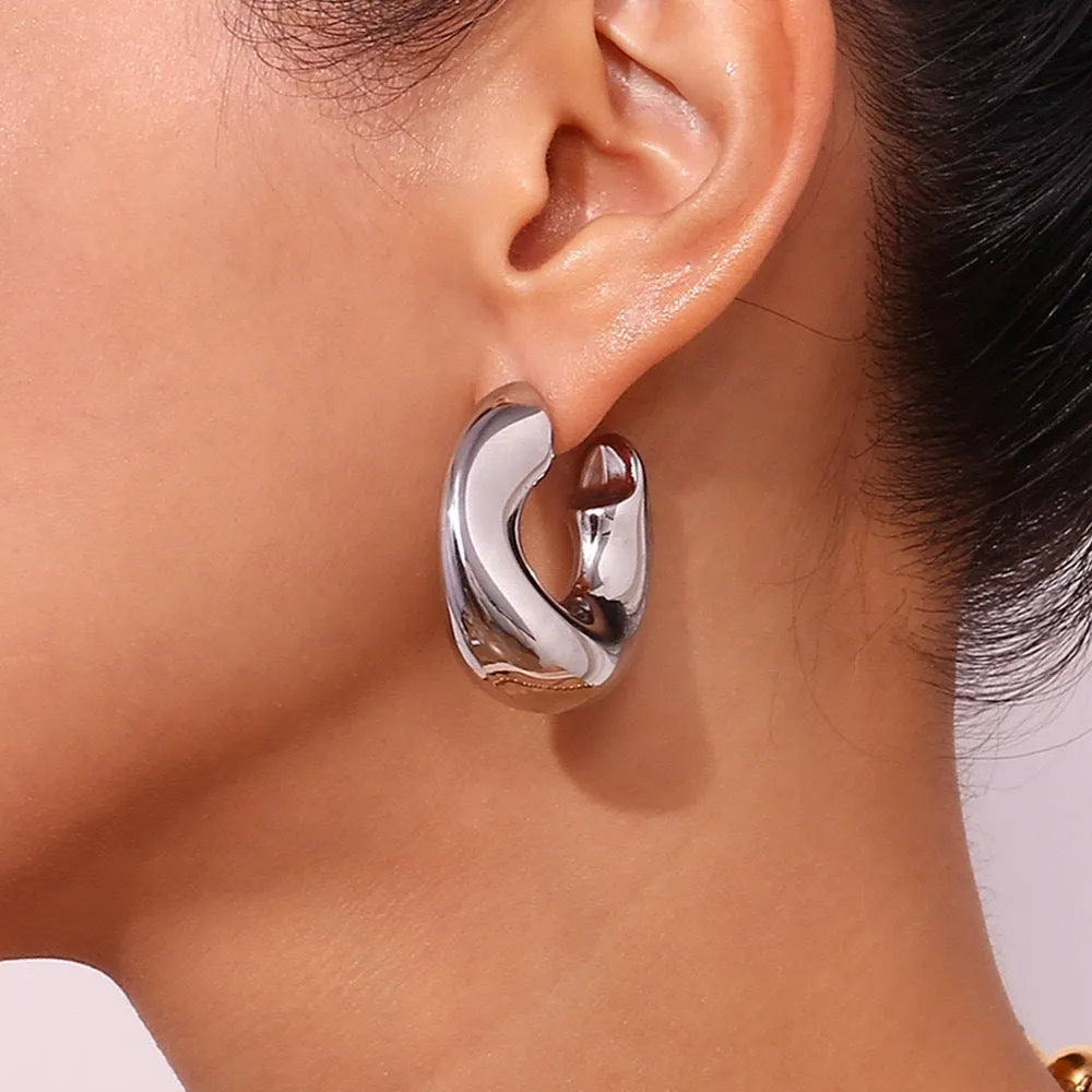 Women's stainless steel geometric hollow irregular line earrings in gold