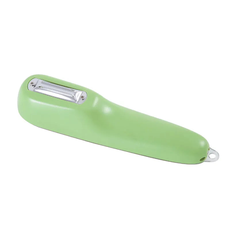 Green fruit and vegetable peeler with a storage tube and stainless steel blade.