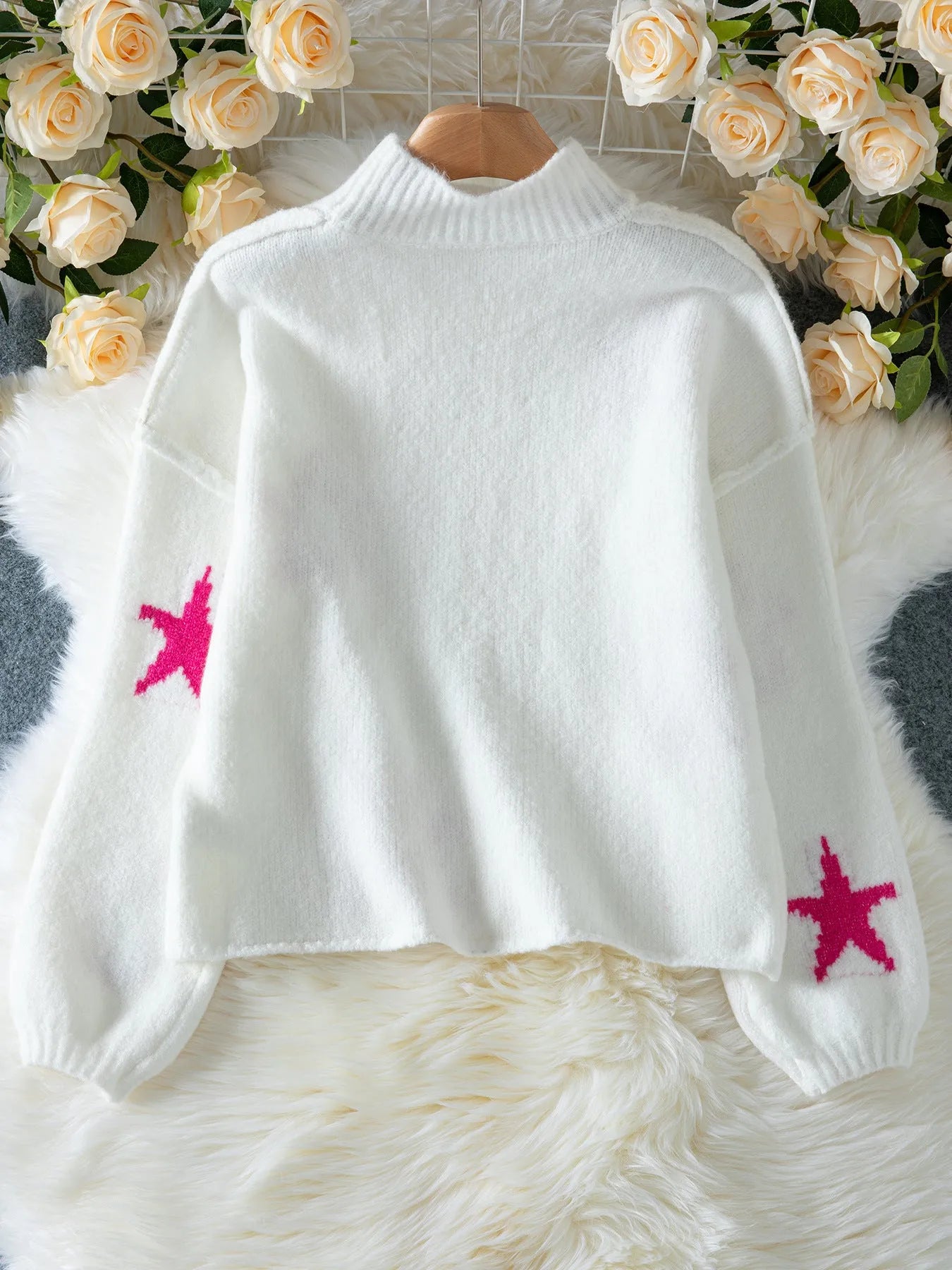 White women's loose turtleneck pullover with a black star pattern on thick imitation velvet fabric