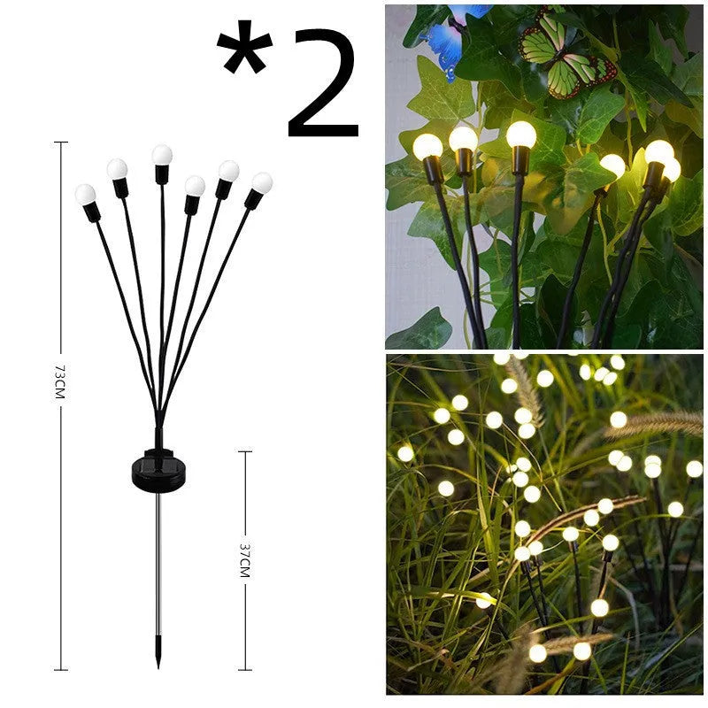 Solar-powered LED ground spike garden light with multiple heads and stainless steel soil plug.