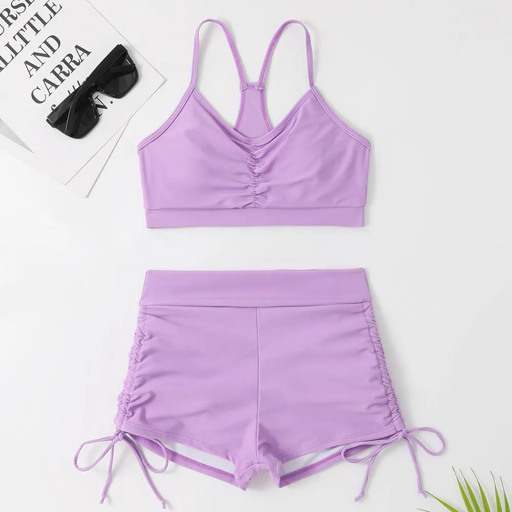 Women's high-waist split swimsuit bikini in purple or black with sleeveless design