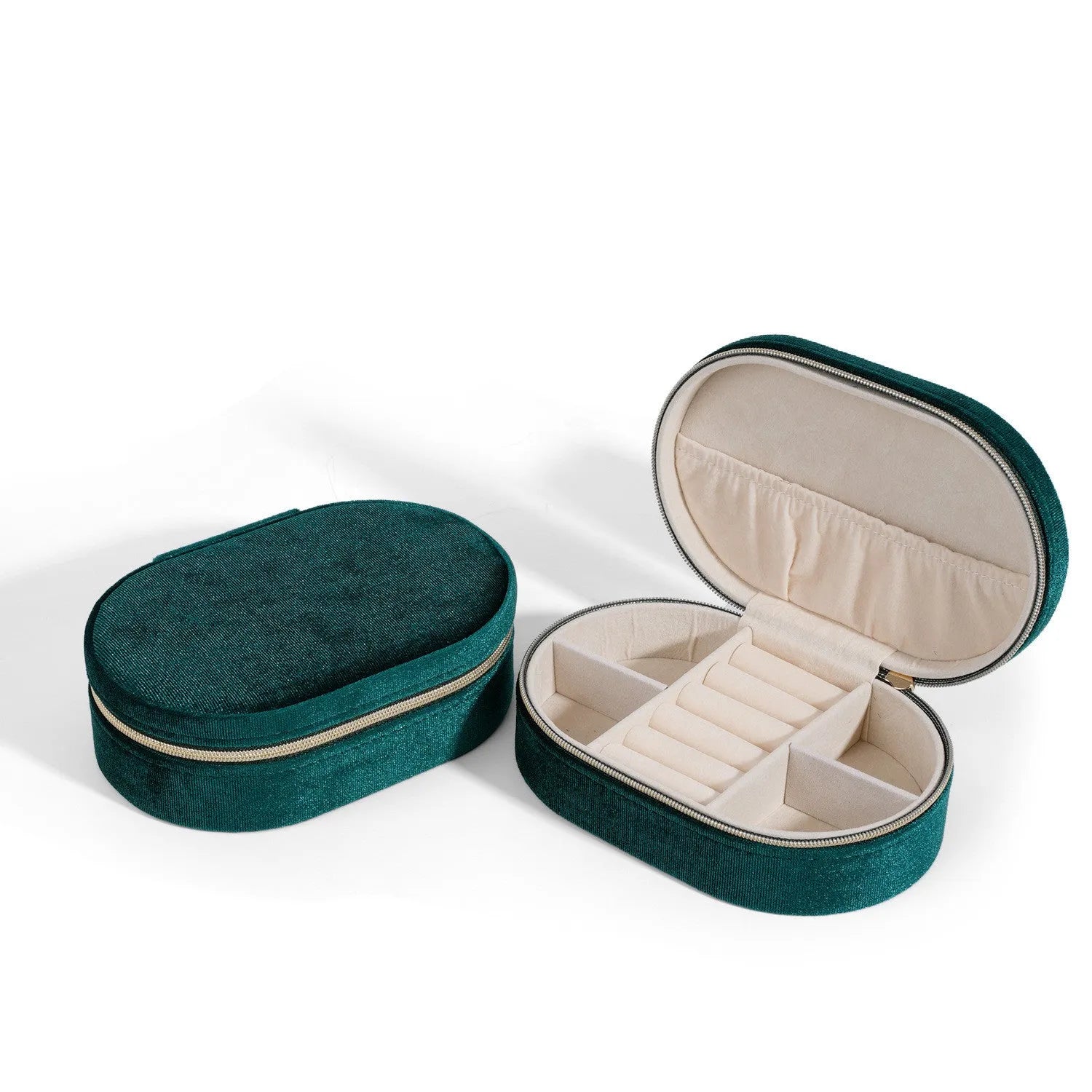 Oval velvet jewellery storage box in lake blue colour, showing flannel-lined interior and compact size.