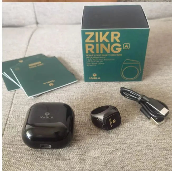 Zikr1 smart Islamic prayer counter ring with OLED display showing time and count, available in black, green, rose gold, and silver colours
