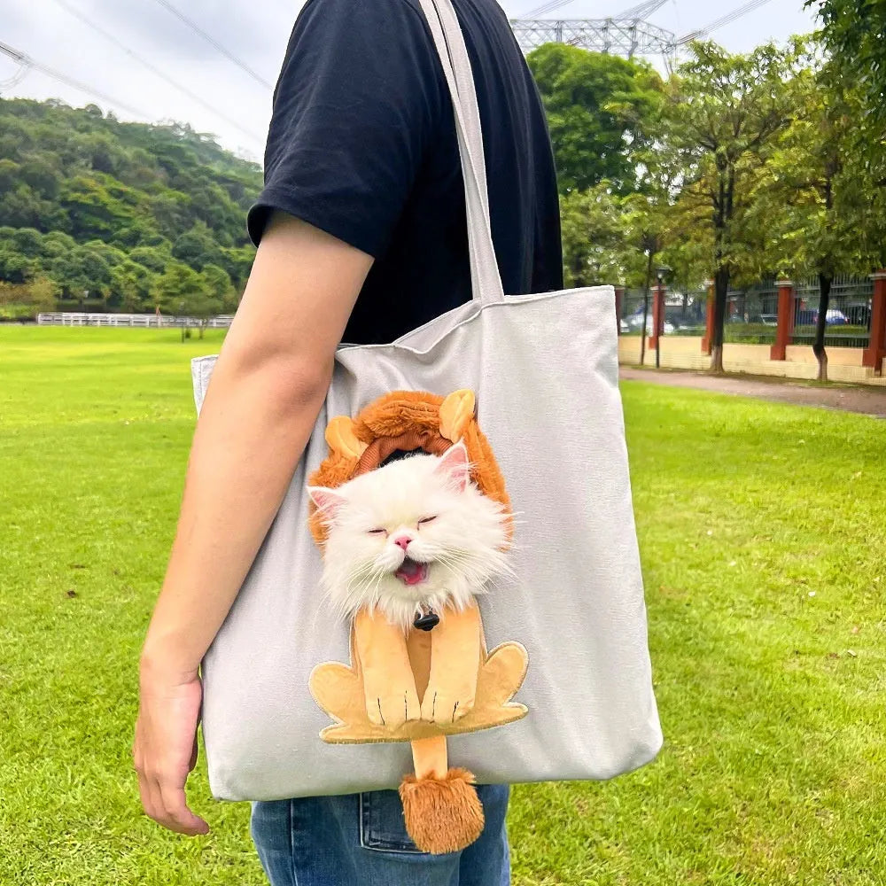Soft canvas pet shoulder bag with cartoon pattern for small dog or cat carrier.