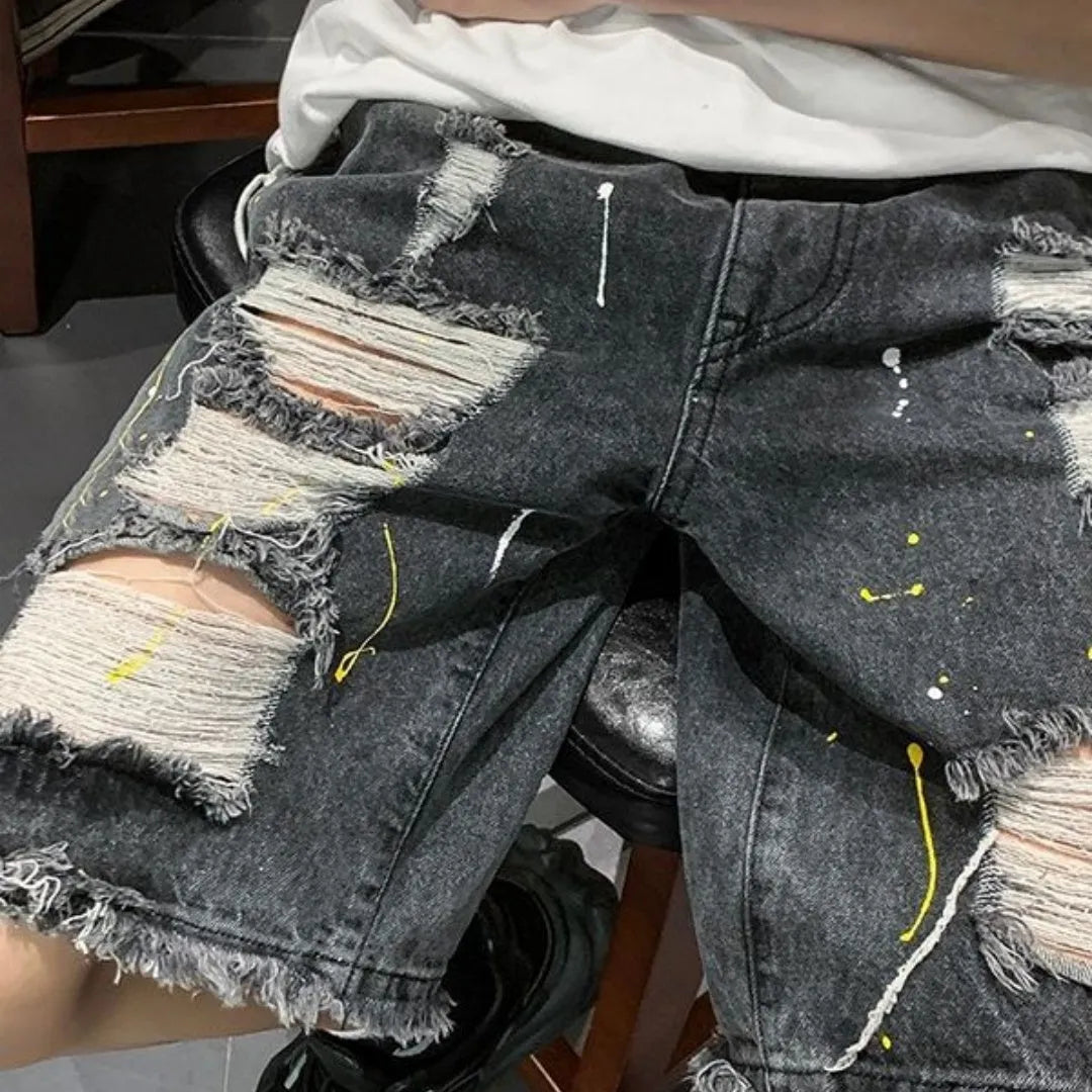 Men's water washed hole denim shorts in loose fit street style, available in black and light blue