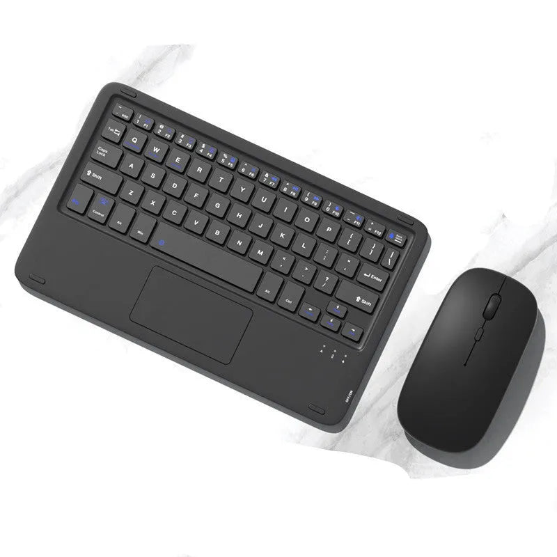 Pink wireless Bluetooth keyboard and mute mouse with USB charging cable on a desk