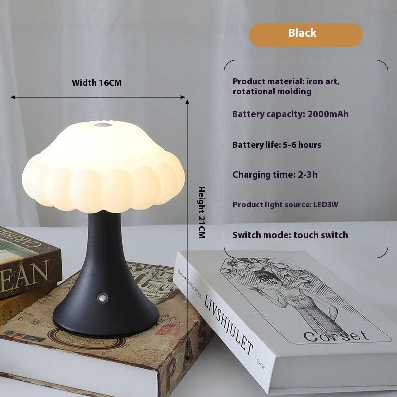 Small mushroom-shaped touch control night light in wood grain finish on a wooden table