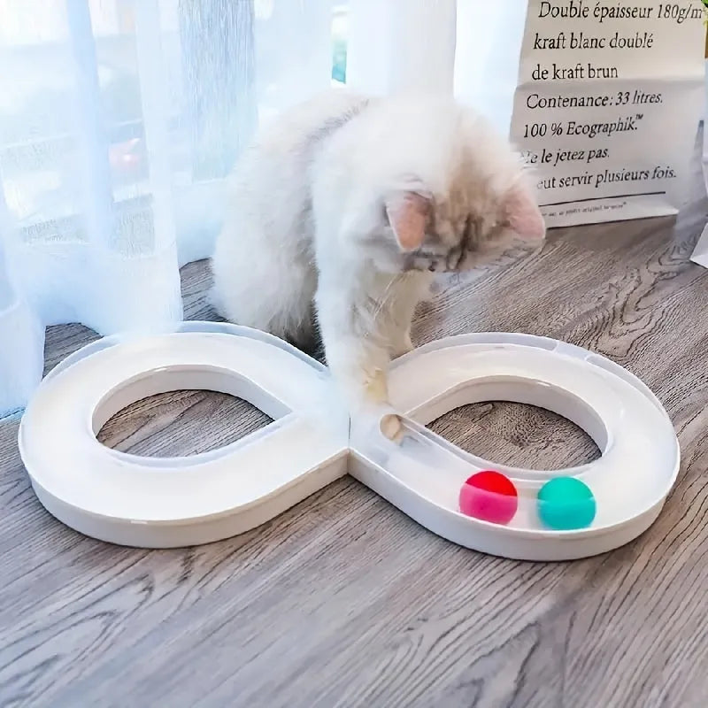 Blue and white cat turntable toy with ball track and teasing stick on wooden floor