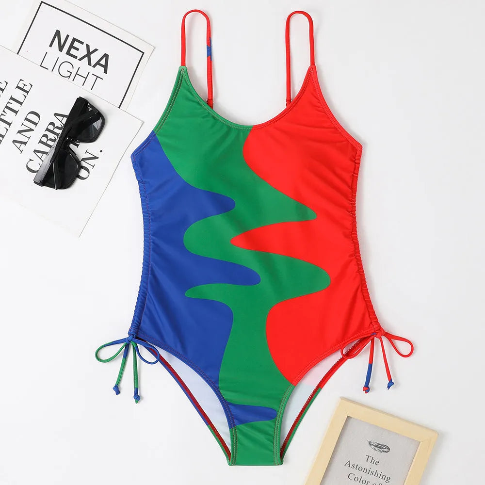 Women's sleeveless one-piece swimsuit in blue colour with backless design for swimming sports