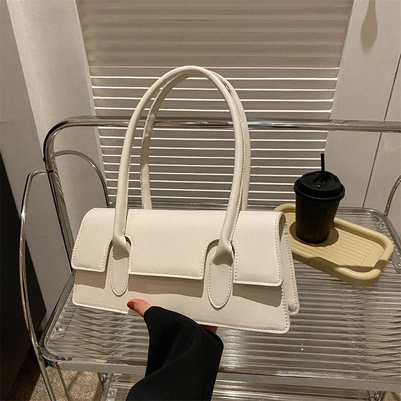 Women's small square shoulder bag in PU leather with retro stitching detail
