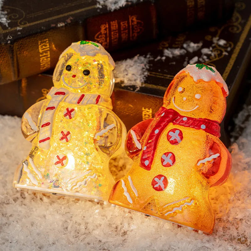 Set of four glowing Christmas gingerbread man and snowman ornaments with different coloured scarves on a festive background.