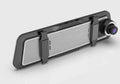 Dual-lens car dash cam with large touch screen mounted on rearview mirror.