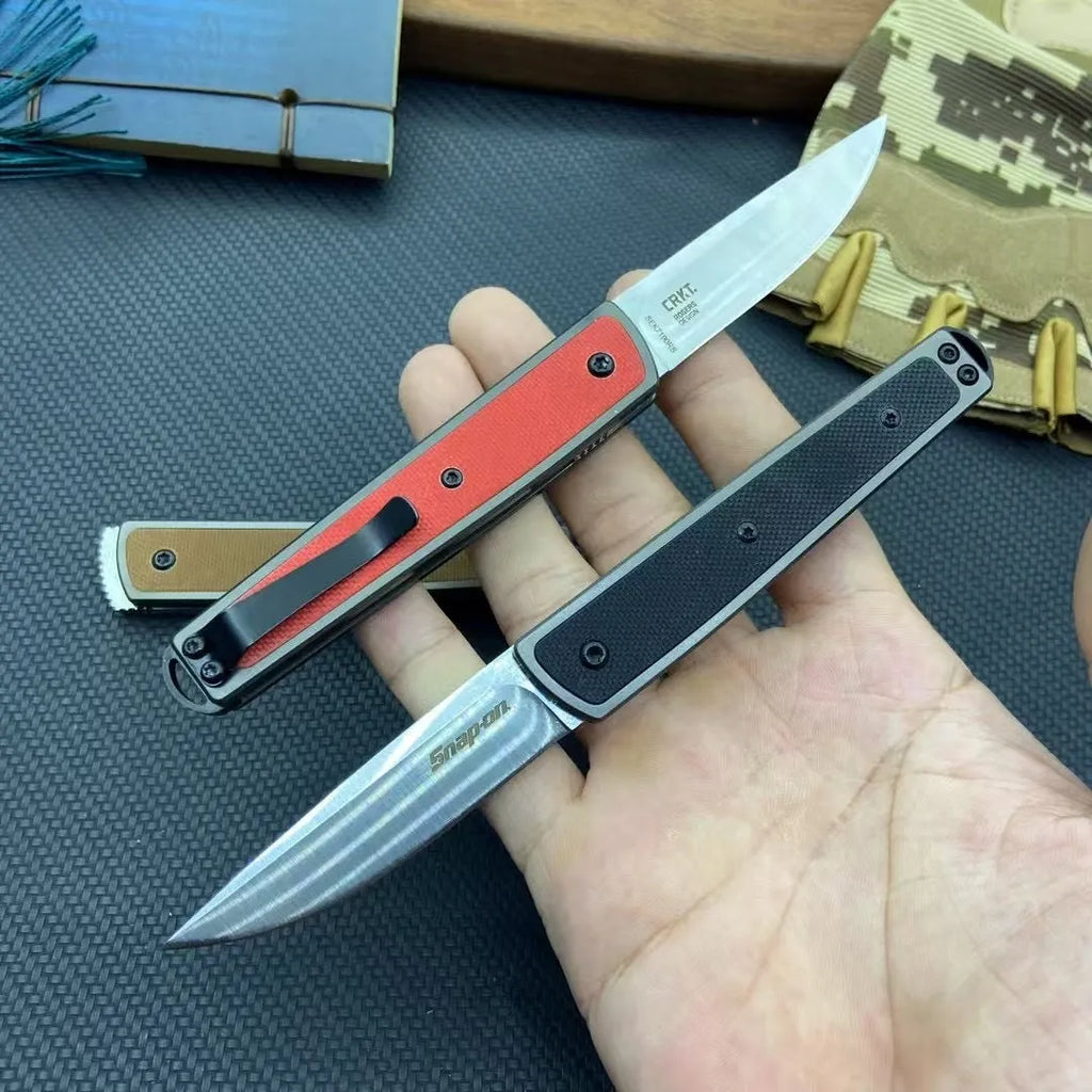 Folding fruit knife with stainless steel blade shown open, demonstrating 17cm total length