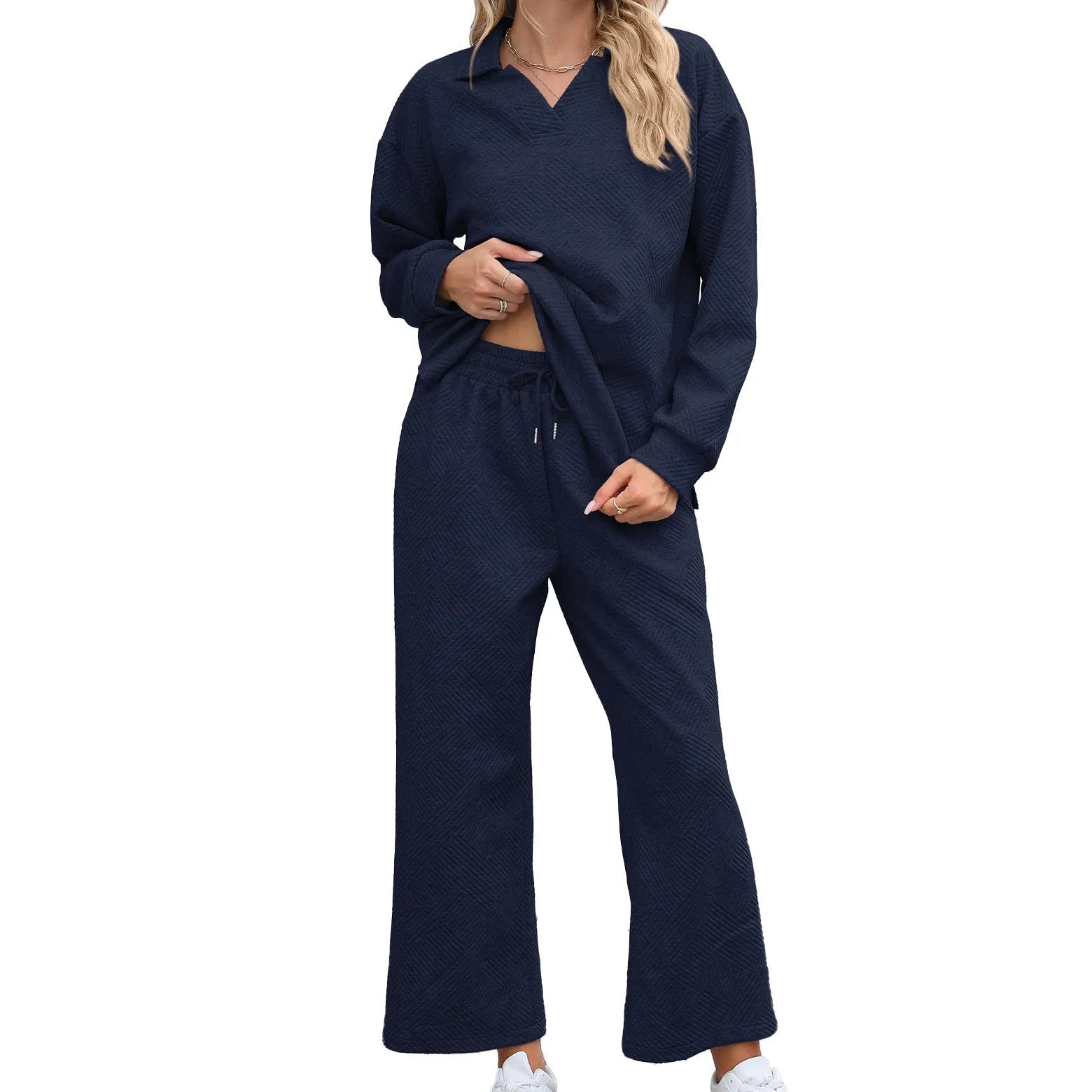 Women's knitted jacquard two-piece suit with geometric pattern detail in solid colour with long sleeves and elastic waist trousers
