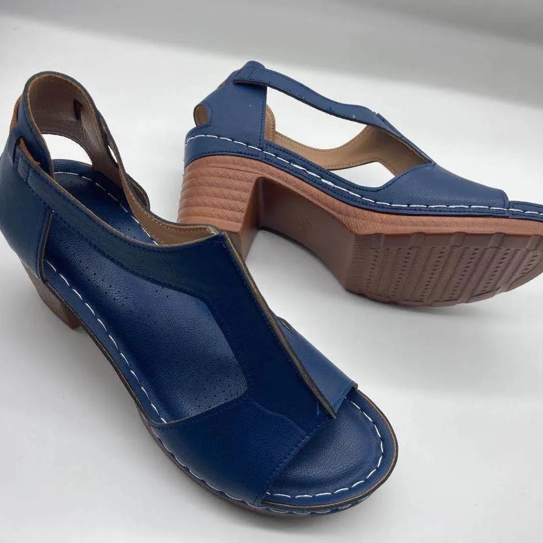 Plus size women's wedge sandals with peep toe, Roman buckle detail, and fish mouth design