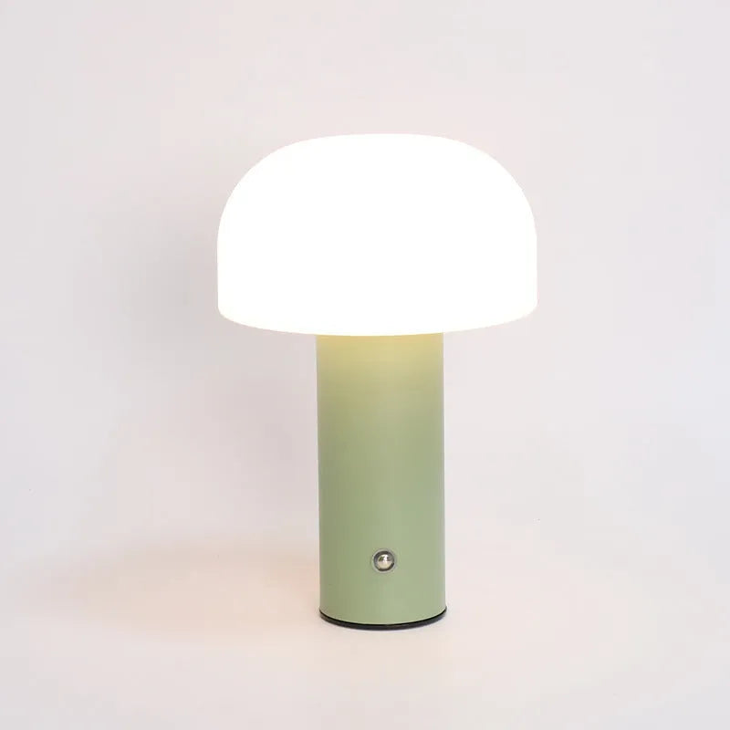 A USB-powered decorative table lamp in a choice of white, black, orange, or green colours.