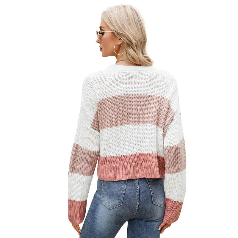 Women's striped short sleeve pullover sweater in loose fit with pink, dark blue, or yellow stripe options