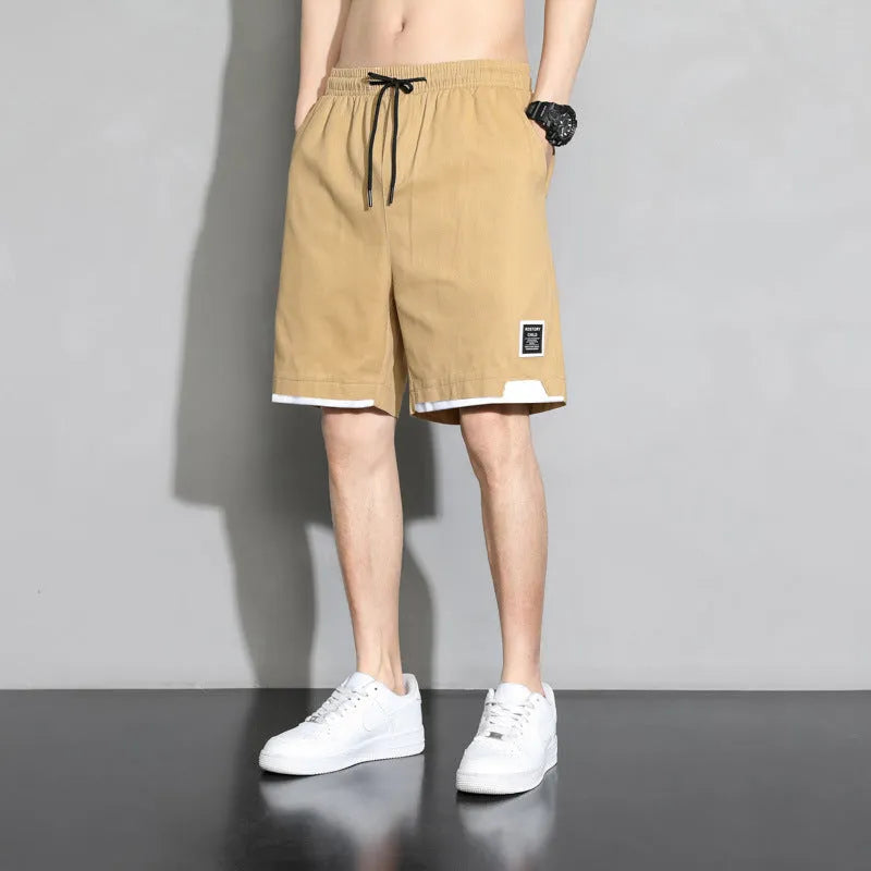 Boys' plus size cotton shorts in overalls style, shown in black, khaki and white.