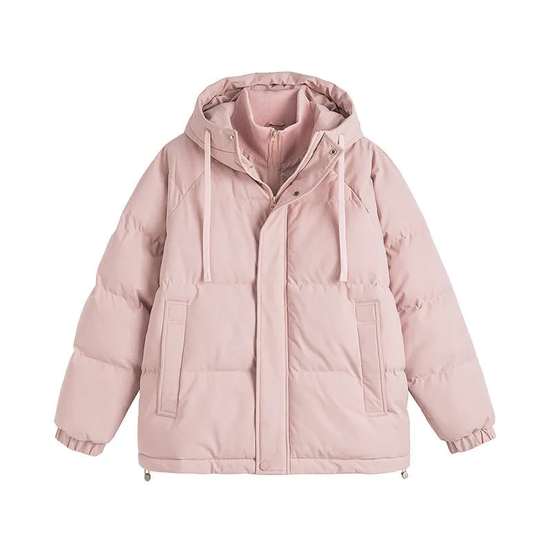 Loose beige cotton-padded jacket with side seam pockets on a hanger